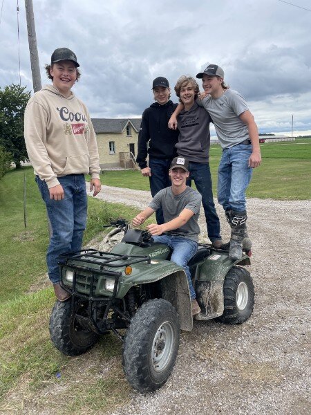 Connor and friends on the ATV